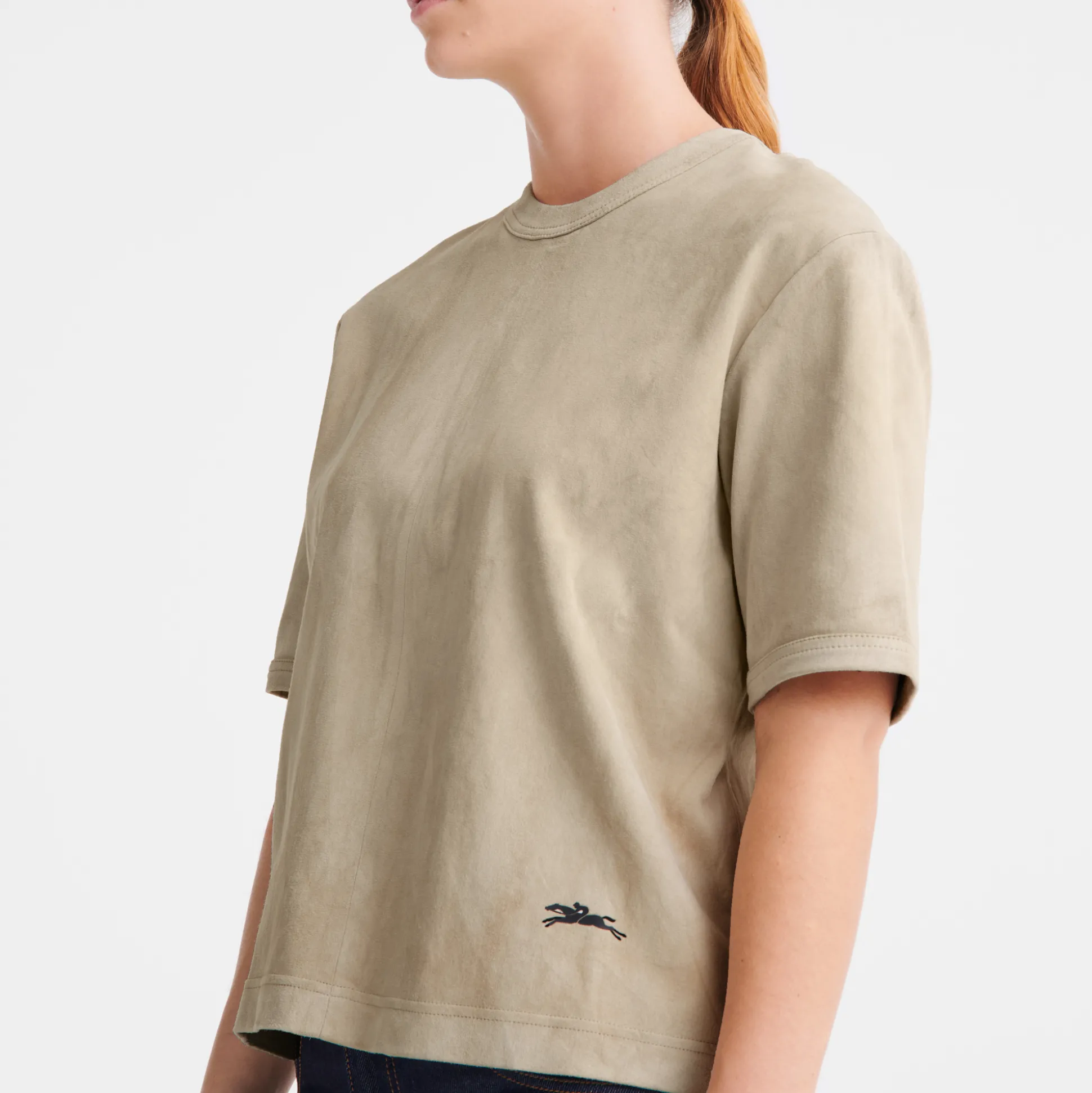 top_corto_in_pelle_4-1.webp Outlet Longchamp Top corto in pelle Beige